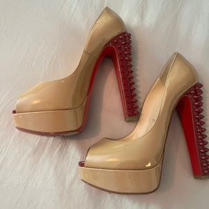 Christian Louboutin Nude Platform Pumps with Spiked Red Heels